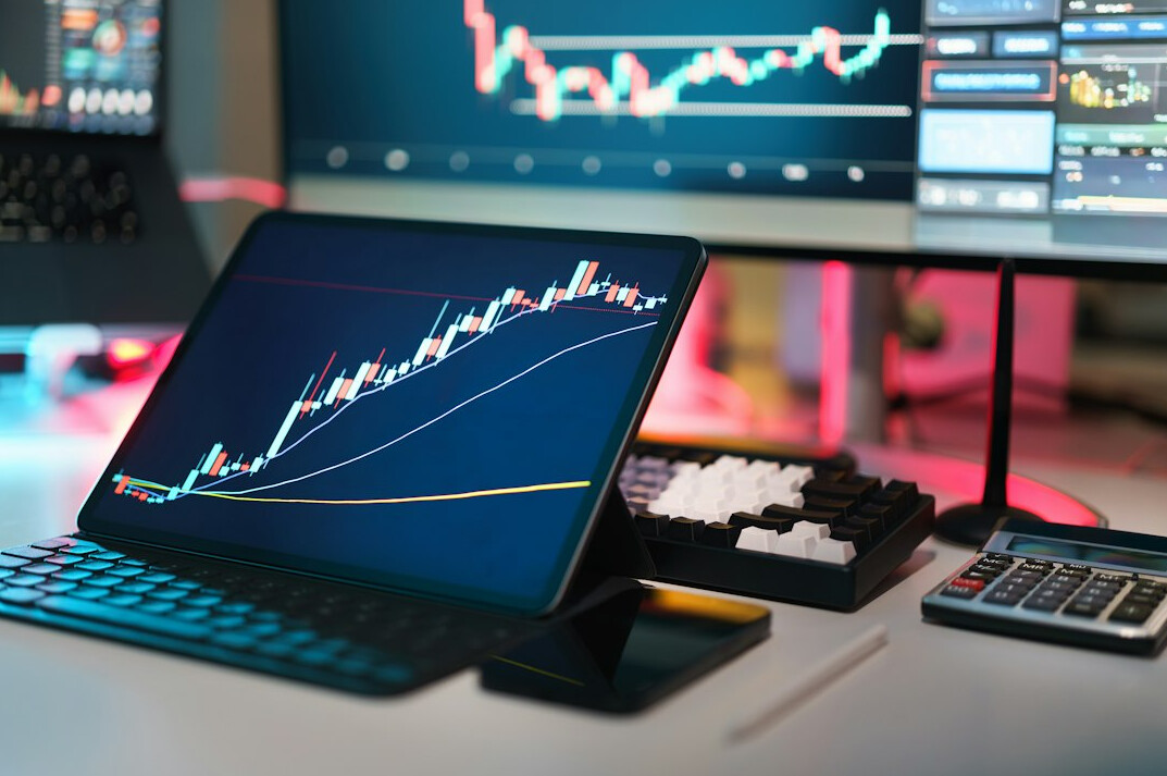 financial charts on screen