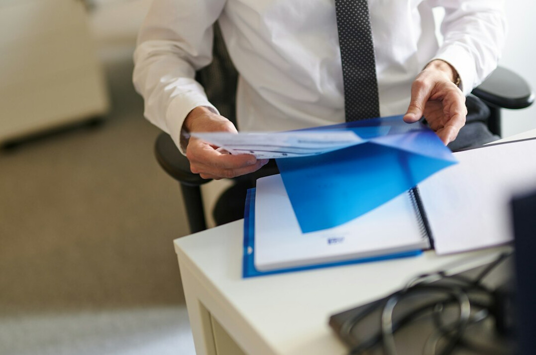 person reviewing insurance documents