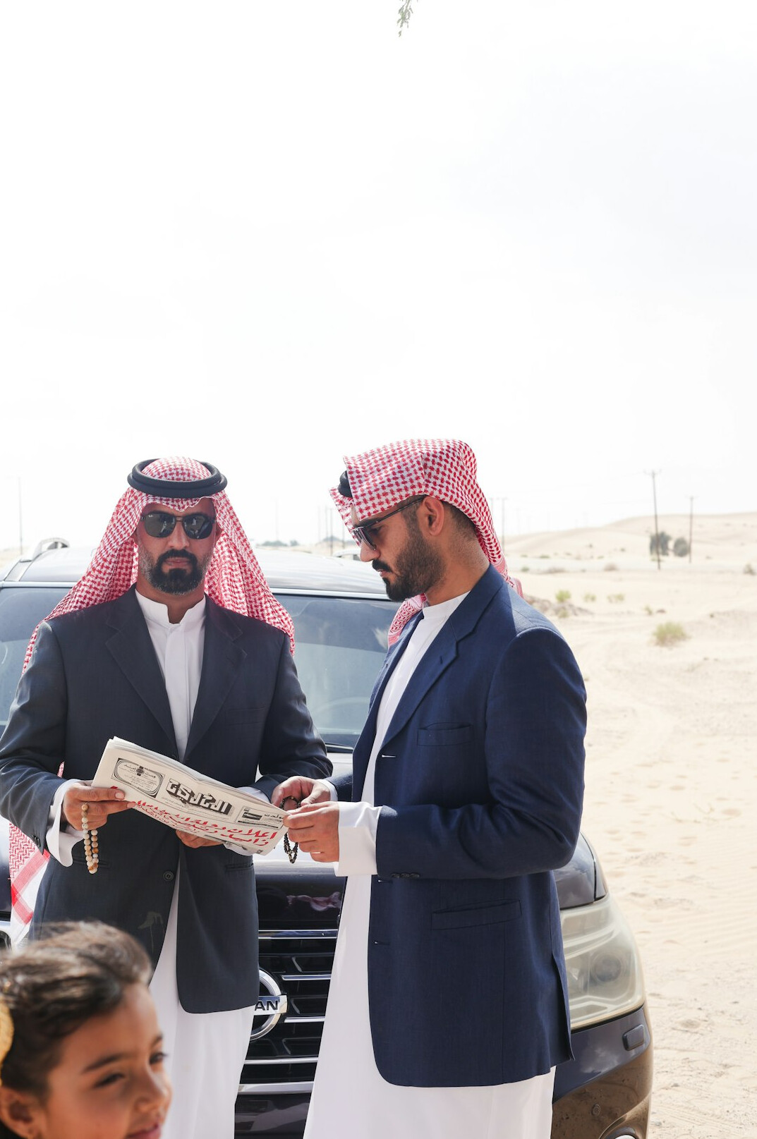 Financial advisor showing insurance documents to a client