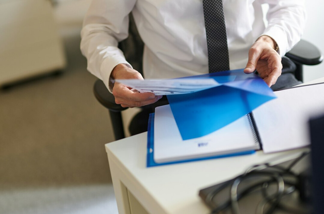 investor reviewing insurance papers